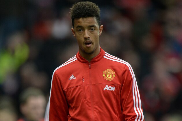 Manchester United's English defender Cameron Borthwick-Jackson leaves the pitch with teammates at half-time during the English Premier League football match between Manchester United and West Bromwich Albion at Old Trafford stadium in Manchester, north west England, on November 7, 2015.     AFP PHOTO / OLI SCARFF

RESTRICTED TO EDITORIAL USE. No use with unauthorized audio, video, data, fixture lists, club/league logos or 'live' services. Online in-match use limited to 75 images, no video emulation. No use in betting, games or single club/league/player publications.        (Photo credit should read OLI SCARFF/AFP/Getty Images)