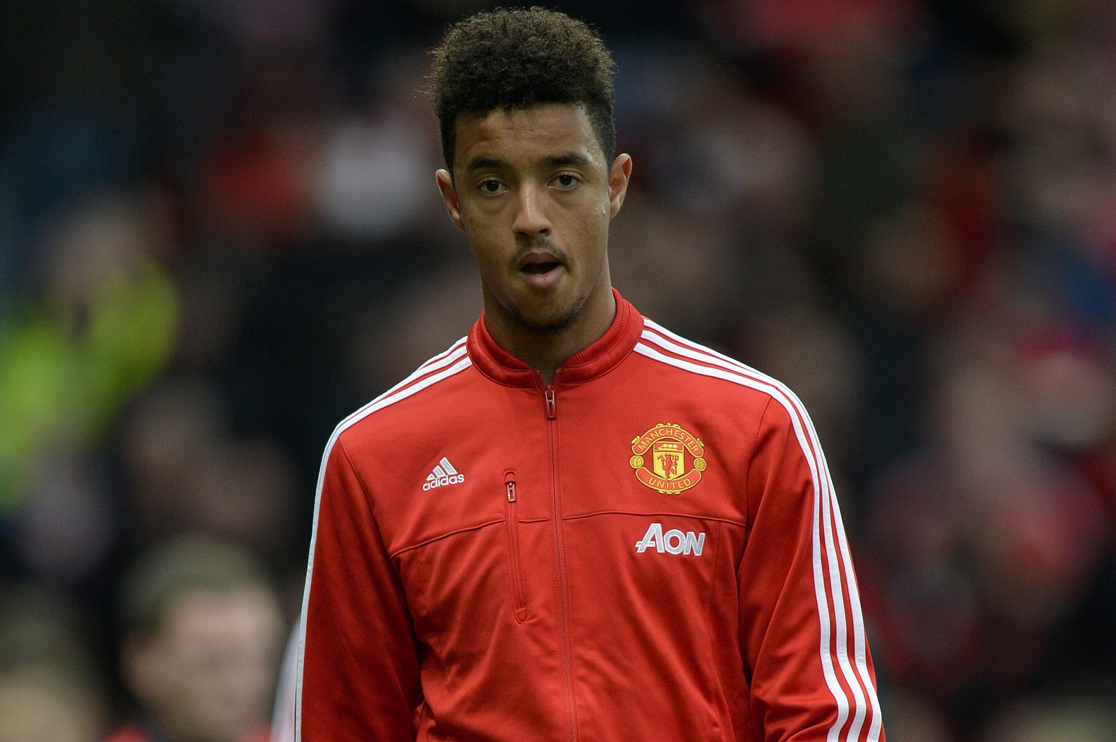 Manchester United's English defender Cameron Borthwick-Jackson leaves the pitch with teammates at half-time during the English Premier League football match between Manchester United and West Bromwich Albion at Old Trafford stadium in Manchester, north west England, on November 7, 2015.     AFP PHOTO / OLI SCARFF

RESTRICTED TO EDITORIAL USE. No use with unauthorized audio, video, data, fixture lists, club/league logos or 'live' services. Online in-match use limited to 75 images, no video emulation. No use in betting, games or single club/league/player publications.        (Photo credit should read OLI SCARFF/AFP/Getty Images)