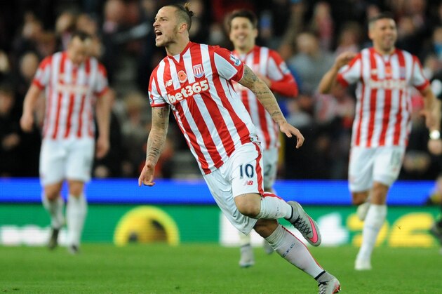 Stoke’s Marko Arnautovic celebrates after scoring against Chelsea during the English Premier League soccer match between Stoke City and Chelsea at the Britannia Stadium, Stoke on Trent, England, Saturday, Nov. 7, 2015. (AP Photo/Rui Vieira)