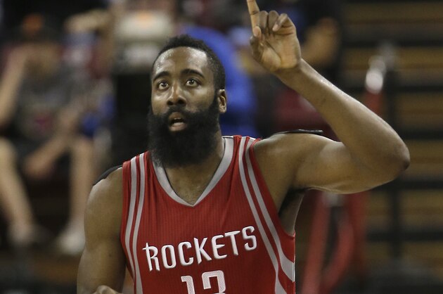 Houston Rockets guard James Harden gestures after making a three-point shot against the Sacramento Kings in the final minutes of the Rockets 116-110 win over the Sacramento Kings in an NBA basketball game in Sacramento, Calif., Friday, Nov. 6, 2015.(AP Photo/Rich Pedroncelli)