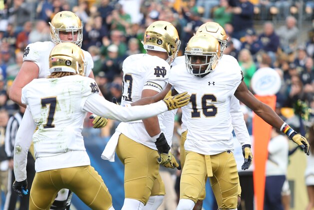 Nov 7, 2015; Pittsburgh, PA, USA; Notre Dame Fighting Irish wide receiver Will Fuller (7) and wide receiver Torii Hunter Jr. (16) celebrate a touchdown by Hunter against the Pittsburgh Panthers during the second quarter at Heinz Field. Mandatory Credit: Charles LeClaire-USA TODAY Sports