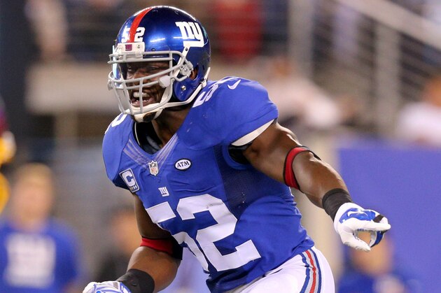 Sep 24, 2015; East Rutherford, NJ, USA; New York Giants linebacker Jon Beason (52) calls a defensive play against the Washington Redskins during the third quarter at MetLife Stadium. Mandatory Credit: Brad Penner-USA TODAY Sports