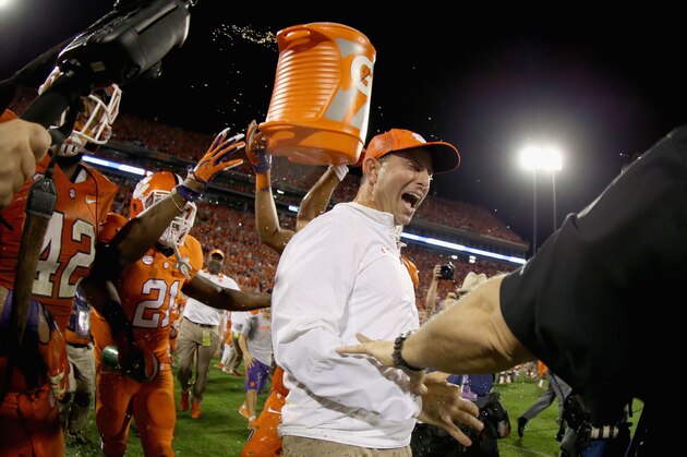CLEMSON, SC - NOVEMBER 07:  Head coach Dabo Swinney of the Clemson Tigers celebrates with his team after defeating the Florida State Seminoles 23-13 at Memorial Stadium on November 7, 2015 in Clemson, South Carolina.  (Photo by Streeter Lecka/Getty Images)