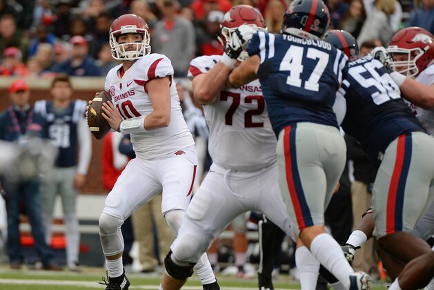 Arkansas quarterback Brandon Allen (10) looks to pass during the first quarter of an NCAA college football game against Mississippi in Oxford, Miss., Saturday, Nov. 7, 2015. (AP Photo/Thomas Graning)