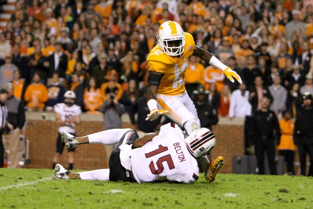 Nov 7, 2015; Knoxville, TN, USA; South Carolina Gamecocks wide receiver Matrick Belton (15) with the ball while defended by Tennessee Volunteers defender Emmanuel Moseley at Neyland Stadium. Mandatory Credit: Randy Sartin-USA TODAY Sports.