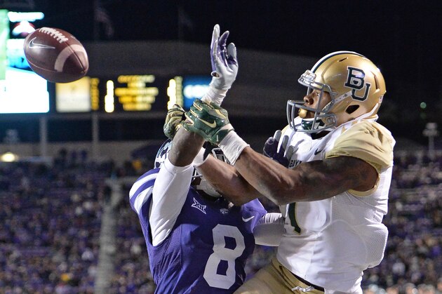 MANHATTAN, KS - NOVEMBER 05:  Defensive back Duke Shelley #8 of the Kansas State Wildcats brakes up a pass in the end zone intended for wide receiver Corey Coleman #1 of the Baylor Bears during the second half on November 5, 2015 at Bill Snyder Family Stadium in Manhattan, Kansas.  (Photo by Peter G. Aiken/Getty Images)