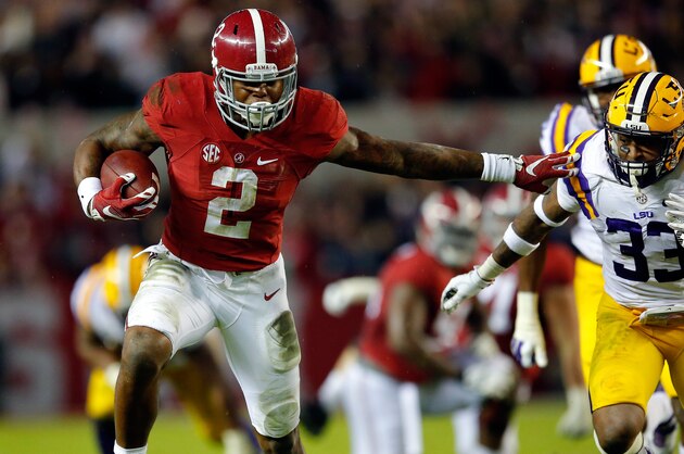 TUSCALOOSA, AL - NOVEMBER 07:  Derrick Henry #2 of the Alabama Crimson Tide rushes away from Jamal Adams #33 of the LSU Tigers in the second quarter at Bryant-Denny Stadium on November 7, 2015 in Tuscaloosa, Alabama.  (Photo by Kevin C. Cox/Getty Images)