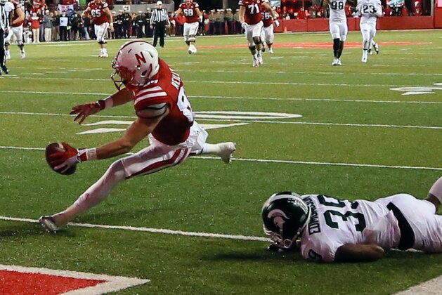 Nebraska wide receiver Brandon Reilly (87) scores a touchdown against Michigan State cornerback Jermaine Edmondson (39) during the second half of an NCAA college football game in Lincoln, Neb., Saturday, Nov. 7, 2015. Nebraska won 39-38. (AP Photo/Nati Harnik)