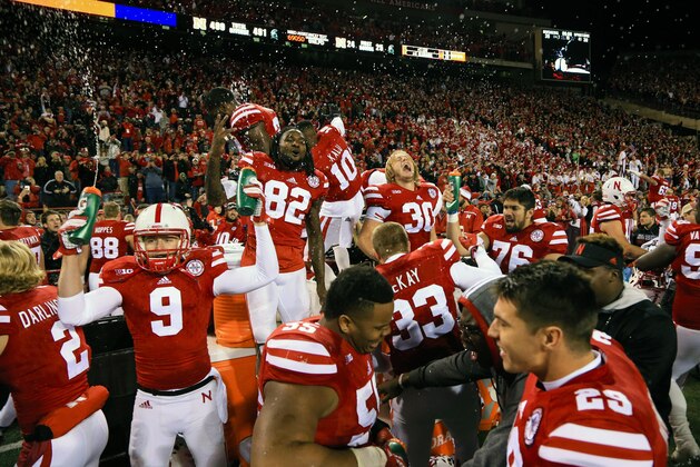 Nebraska players celebrate following their 39-38 win over Michigan State in an NCAA college football game in Lincoln, Neb., Saturday, Nov. 7, 2015. (AP Photo/Nati Harnik)