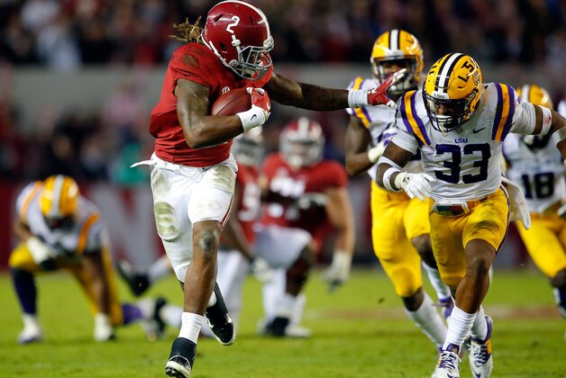 TUSCALOOSA, AL - NOVEMBER 07:  Derrick Henry #2 of the Alabama Crimson Tide rushes away from Jamal Adams #33 of the LSU Tigers in the second quarter at Bryant-Denny Stadium on November 7, 2015 in Tuscaloosa, Alabama.  (Photo by Kevin C. Cox/Getty Images)