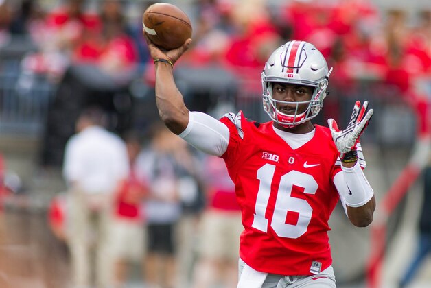 Sep 12, 2015; Columbus, OH, USA; Ohio State Buckeyes quarterback J.T. Barrett (16) warms up before the game against the Hawaii Warriors at Ohio Stadium. The Ohio State Buckeyes beat the Hawaii Warriors by the score of 38-0. Mandatory Credit: Trevor Ruszkowski-USA TODAY Sports