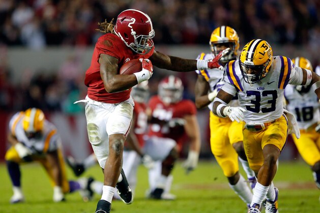 TUSCALOOSA, AL - NOVEMBER 07:  Derrick Henry #2 of the Alabama Crimson Tide rushes away from Jamal Adams #33 of the LSU Tigers in the second quarter at Bryant-Denny Stadium on November 7, 2015 in Tuscaloosa, Alabama.  (Photo by Kevin C. Cox/Getty Images)