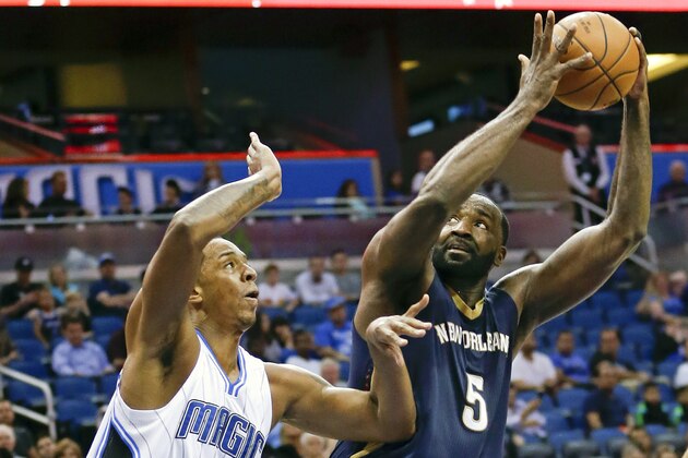 New Orleans Pelicans' Kendrick Perkins (5) looks for a shot over Orlando Magic's Channing Frye (8) during the first half of an NBA preseason basketball game, Wednesday, Oct. 21, 2015, in Orlando, Fla. (AP Photo/John Raoux)