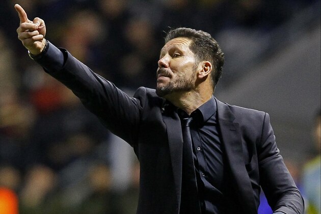 Atletico Madrid coach Diego Simeone gestures during a Champions League Group C soccer match between Astana, Kazakhstan, and Atletico Madrid, in Astana, Kazakhstan, Tuesday, Nov. 3, 2015. (AP Photo/Alexey Filippov)
