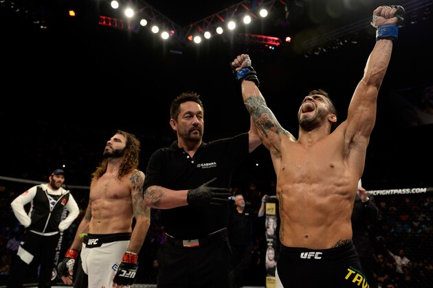 SAO PAULO, BRAZIL - NOVEMBER 07: Thiago Tavares of Brazil celebrates victory by submission over Clay Guida of the United States in their featherweight bout during the UFC Fight Night Belfort v Henderson at Ibirapuera Gymnasium on November 7, 2015 in Sao Paulo, Brazil. (Photo by Buda Mendes/Zuffa LLC/Zuffa LLC via Getty Images)