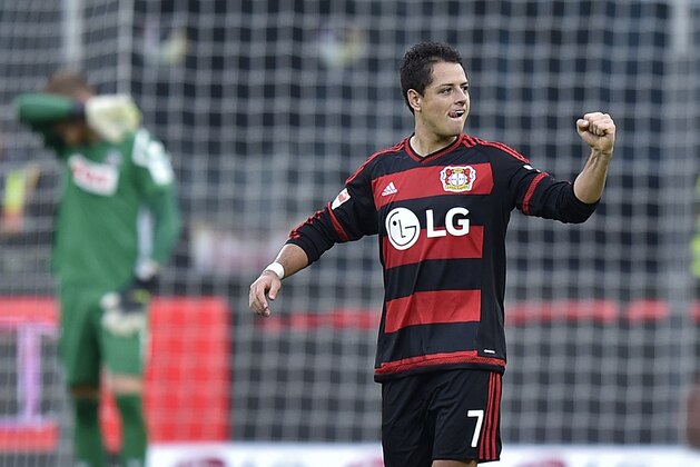 Leverkusen’s Javier Hernandez, right, celebrates after scoring against Cologne's goalkeeper Timo Horn, left, during the German Bundesliga soccer match between Bayer Leverkusen and 1. FC Cologne in Leverkusen, Germany, Saturday, Nov. 7, 2015. (AP Photo/Martin Meissner) Leverkusen’s Javier Hernandez, right, celebrates after scoring against Cologne's goalkeeper Timo Horn, left, during the German Bundesliga soccer match between Bayer Leverkusen and 1. FC Cologne in Leverkusen, Germany, Saturday, Nov. 7, 2015. (AP Photo/Martin Meissner)