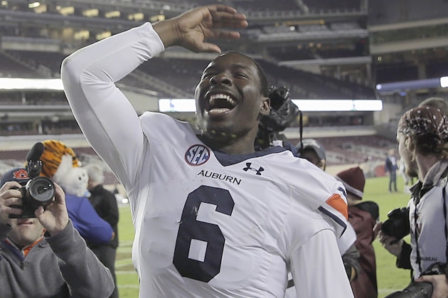 Auburn quarterback Jeremy Johnson celebrates after beating Texas A&M in an NCAA college football game, Saturday, Nov. 7, 2015, in College Station, Texas. Auburn won 26-10. (AP Photo/David J. Phillip)