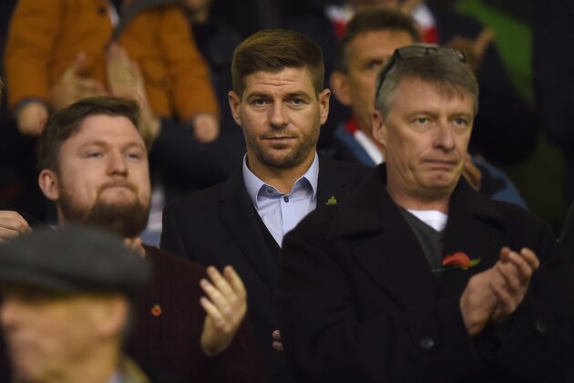 Former Liverpol player and current LA Galaxy midfielder, Steven Gerrard watches the players warm up ahead of the English Premier League football match between Liverpool and Crystal Palace at the Anfield stadium in Liverpool, north-west England on November 8, 2015.     AFP PHOTO / PAUL ELLIS

RESTRICTED TO EDITORIAL USE. No use with unauthorized audio, video, data, fixture lists, club/league logos or 'live' services. Online in-match use limited to 75 images, no video emulation. No use in betting, games or single club/league/player publications.        (Photo credit should read PAUL ELLIS/AFP/Getty Images)