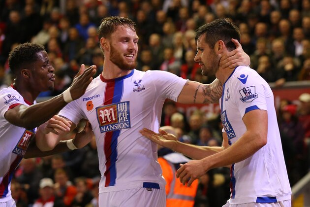 LIVERPOOL, ENGLAND - NOVEMBER 08: Scott Dann of Crystal Palace (R) celebrates with his team mates after scoring his side's second goal during the Barclays Premier League match between Liverpool and Crystal Palace at Anfield on November 8, 2015 in Liverpool, England. (Photo by Alex Livesey/Getty Images) LIVERPOOL, ENGLAND - NOVEMBER 08: Scott Dann of Crystal Palace (R) celebrates with his team mates after scoring his side's second goal during the Barclays Premier League match between Liverpool and Crystal Palace at Anfield on November 8, 2015 in Liverpool, England. (Photo by Alex Livesey/Getty Images)