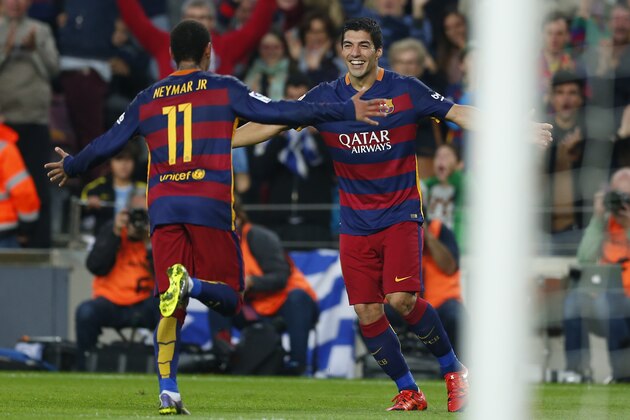 FC Barcelona's Neymar, left, reacts after scoring with his teammate Luis Suarez against Villarreal during a Spanish La Liga soccer match at the Camp Nou stadium in Barcelona, Spain, Sunday, Nov. 8, 2015. (AP Photo/Manu Fernandez)