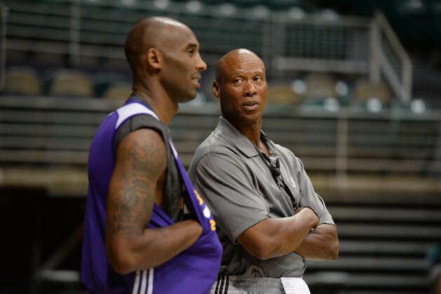 HONOLULU, HI - SEPTEMBER 29: Kobe Bryant chats with Head Coach Byron Scott of the Los Angeles Lakers during training camp on September 29, 2015 at the University of Hawaii, in Honolulu, Hawaii.  NOTE TO USER: User expressly acknowledges and agrees that, by downloading and/or using this Photograph, user is consenting to the terms and conditions of the Getty Images License Agreement. Mandatory Copyright Notice: Copyright 2015 NBAE (Photo by Andrew D. Bernstein/NBAE via Getty Images)