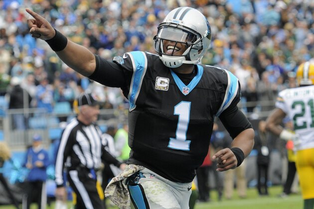 Carolina Panthers' Cam Newton (1) celebrates his touchdown pass against the Green Bay Packers in the first half of an NFL football game in Charlotte, N.C., Sunday, Nov. 8, 2015. (AP Photo/Mike McCarn)