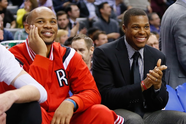 Mar 25, 2015; Toronto, Ontario, CAN; Toronto Raptors center Chuck Hayes (left) and Toronto Raptors guard Kyle Lowry (right) on the bench against the Chicago Bulls at the Air Canada Centre. Chicago defeated Toronto 116-103. Mandatory Credit: John E. Sokolowski-USA TODAY Sports