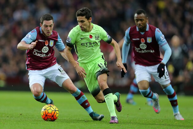 BIRMINGHAM, ENGLAND - NOVEMBER 08:  Jesus Navas of Manchester City and Jordan Veretout of Aston Villa during the Barclays Premier League match between Aston Villa and Manchester City at Villa Park on November 8, 2015 in Birmingham, England.  (Phoyo by James Baylis - AMA/Getty Images)