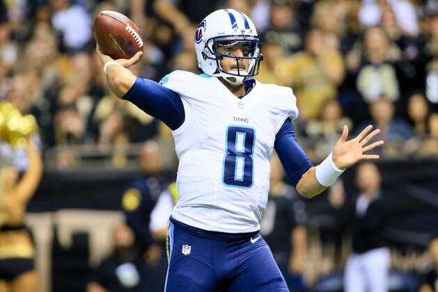Nov 8, 2015; New Orleans, LA, USA; Tennessee Titans quarterback Marcus Mariota (8) throws against the New Orleans Saints during the second half of a game at the Mercedes-Benz Superdome. The Titans defeated the Saints 34-28 in overtime. Mandatory Credit: Derick E. Hingle-USA TODAY Sports