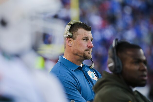 Miami Dolphins head coach Dan Campbell looks at the scoreboard during the second half of an NFL football game against the Buffalo Bills Sunday, Nov. 8, 2015, in Orchard Park, N.Y. The Bills won the game 33-17. (AP Photo/Bill Wippert)