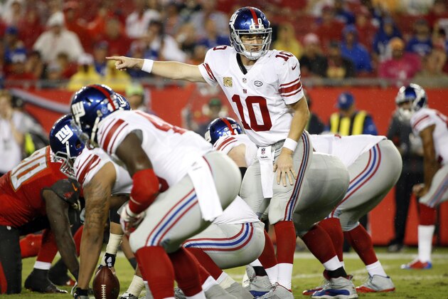 New York Giants quarterback Eli Manning (10) calls a play against the Tampa Bay Buccaneers during the third quarter of an NFL football game Sunday, Nov. 8, 2015, in Tampa, Fla. (AP Photo/Brian Blanco)