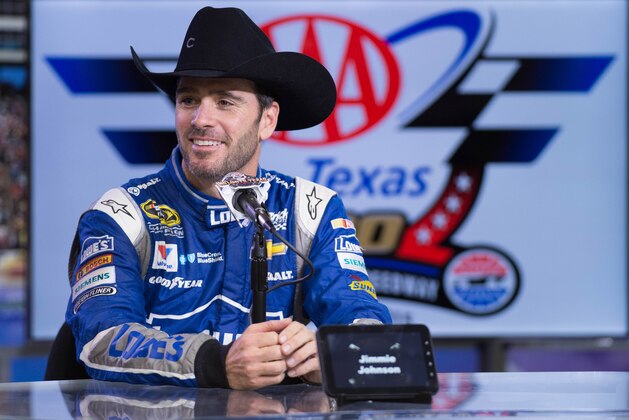 Nov 8, 2015; Fort Worth, TX, USA; Sprint Cup Series driver Jimmie Johnson (48) is interviewed after winning the AAA Texas 500 at Texas Motor Speedway. Mandatory Credit: Jerome Miron-USA TODAY Sports