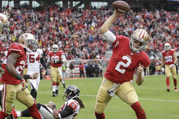 San Francisco 49ers quarterback Blaine Gabbert (2) spikes the ball after running to the 1-yard line against the Atlanta Falcons during the first half of an NFL football game in Santa Clara, Calif., Sunday, Nov. 8, 2015. The 49ers won 17-16. (AP Photo/Marcio Jose Sanchez)