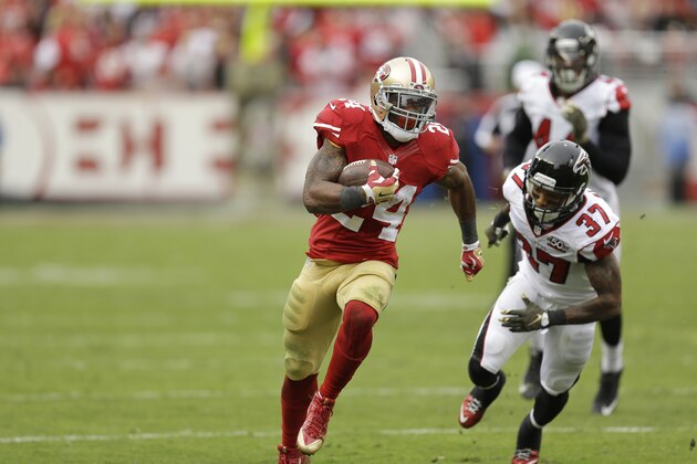 San Francisco 49ers running back Shaun Draughn (24) runs past Atlanta Falcons free safety Ricardo Allen (37) during the first half of an NFL football game in Santa Clara, Calif., Sunday, Nov. 8, 2015. (AP Photo/Ben Margot)