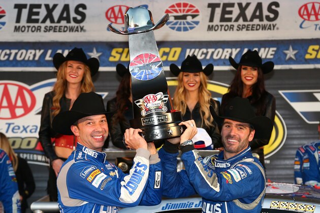 FORT WORTH, TX - NOVEMBER 08:  Jimmie Johnson, driver of the #48 Lowe's Chevrolet, and crew chief Chad Knaus celebrate in victory lane with the trophy after winning the NASCAR Sprint Cup Series AAA Texas 500 at Texas Motor Speedway on November 8, 2015 in Fort Worth, Texas.  (Photo by Sarah Crabill/Getty Images for Texas Motor Speedway)