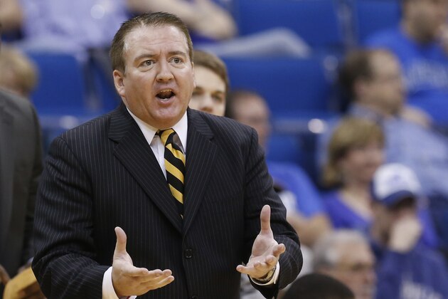 Southern Miss head coach Donnie Tyndall gestures during the championship game in the Conference USA men's NCAA college basketball tournament in Tulsa, Okla., Saturday, March 16, 2013. (AP Photo/Sue Ogrocki)