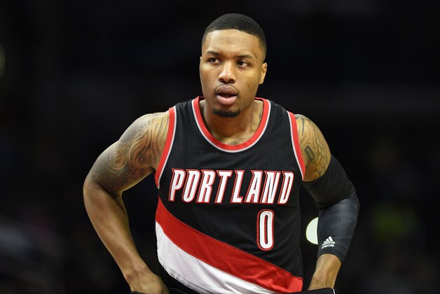 Portland Trail Blazers’ Damian Lillard looks on during the first quarter of an NBA preseason basketball game against the Los Angeles Clippers in Los Angeles, Thursday, Oct. 22, 2015. (AP Photo/Kelvin Kuo)