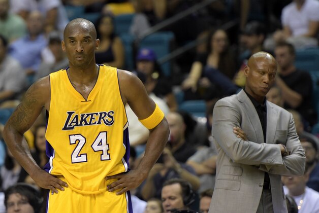 Oct 13, 2015; Las Vegas, NV, USA; Los Angeles Lakers guard Kobe Bryant (24) and coach Byron Scott react during the game against the Sacramento Kings at the MGM Grand Garden Arena. Mandatory Credit: Kirby Lee-USA TODAY Sports