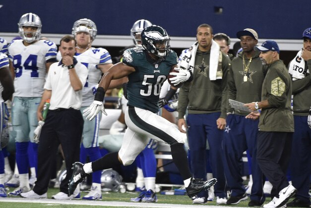 Philadelphia Eagles' Jordan Hicks (58) runs back an interception from the Dallas Cowboys for a touchdown in the second half of an NFL football game, Sunday, Nov. 8, 2015, in Arlington, Texas. (AP Photo/Michael Ainsworth)