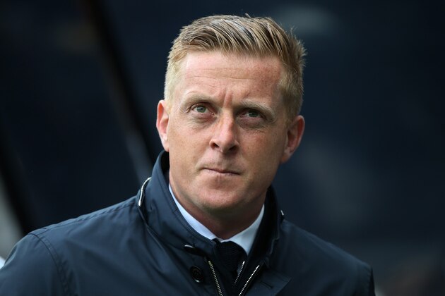 Swansea City's manager Garry Monk awaits the start of their English Premier League soccer match between Newcastle United and Swansea City at St James' Park, Newcastle, England, Saturday, April 25, 2015. (AP Photo/Scott Heppell)