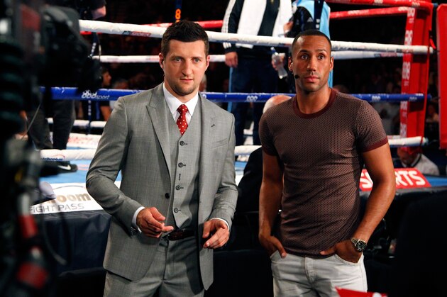 LIVERPOOL, ENGLAND - JULY 12:  Boxers Carl Froch (L) and James DeGale are seen ring side as they wait for a television interview during the Collision Course fight night at the Liverpool Echo Arena on July 12, 2014 in Liverpool, England. (Photo by Paul Thomas/Getty Images)