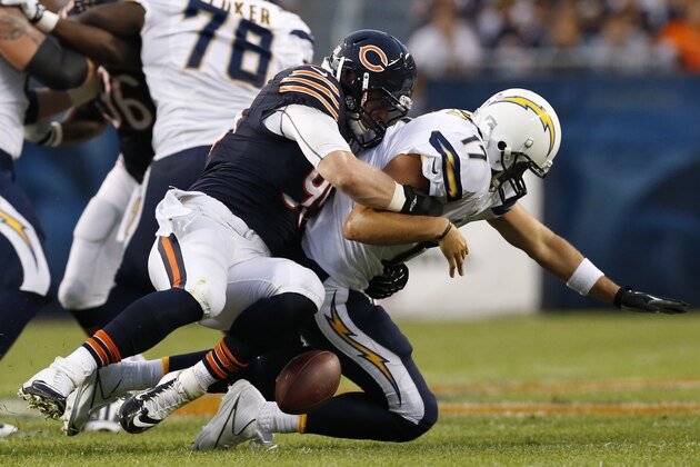 Chicago Bears defensive end Shea McClellin (99) sacks San Diego Chargers quarterback Philip Rivers (17) during the first half of the preseason NFL football game, Thursday, Aug. 15, 2013, in Chicago. Rivers loses the ball which was recovered by Bears safety Major Wright on the play. (AP Photo/Charles Rex Arbogast)