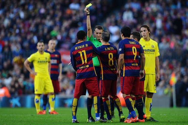 BARCELONA, SPAIN - NOVEMBER 08:  Neymar of FC Barcelona is shown a yellow card by the referee Clos Gomez during the La Liga match between FC Barcelona and Villarreal CF at Camp Nou on November 8, 2015 in Barcelona, Spain.  (Photo by David Ramos/Getty Images)