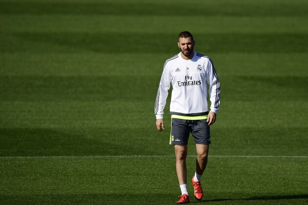 Real Madrid's French forward Karim Benzema walks during a training session at Valdebebas Sport City in Madrid on November 7, 2015 on the eve of their Liga's football match against Sevilla . AFP PHOTO/ PIERRE-PHILIPPE MARCOU        (Photo credit should read PIERRE-PHILIPPE MARCOU/AFP/Getty Images)