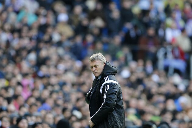 Real Sociedad’s coach David Moyes walks back to the bench during a Spanish La Liga soccer match between Real Madrid and Real Sociedad at the Santiago Bernabeu stadium in Madrid, Spain, Saturday Jan. 31, 2015. (AP Photo/Paul White)