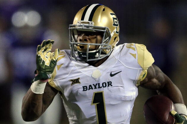 Baylor wide receiver Corey Coleman (1) takes a Jarrett Stidham pass to the end zone during the first half of an NCAA college football game against Kansas State in Manhattan, Kan., Thursday, Nov. 5, 2015. (AP Photo/Orlin Wagner)