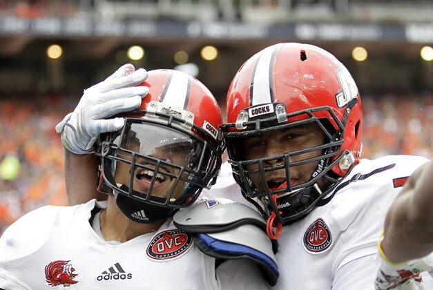 Sep 12, 2015; Auburn, AL, USA;  Jacksonville State Gamecocks receiver Josh Barge (12) celebrates with lineman Blake Burks (72) after scoring a touchdown against the Auburn Tigers during the second quarter at Jordan Hare Stadium. Mandatory Credit: John Reed-USA TODAY Sports