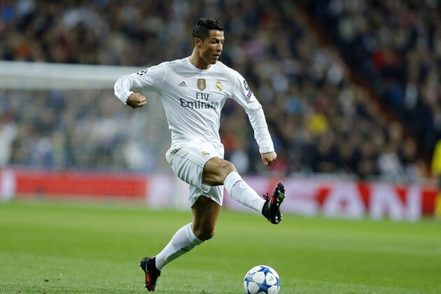 Real Madrid's Cristiano Ronaldo controls the ball during the Champions League group A soccer match between Real Madrid and PSG at the Santiago Bernabeu stadium in Madrid, Tuesday, Nov. 3, 2015. (AP Photo/Francisco Seco)
