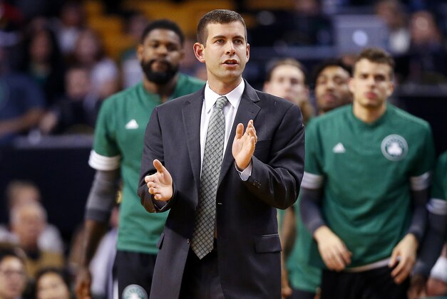 Oct 22, 2015; Boston, MA, USA; Boston Celtics head coach Brad Stevens applauds his players during the first half against the New York Knicks at TD Garden. Mandatory Credit: Winslow Townson-USA TODAY Sports