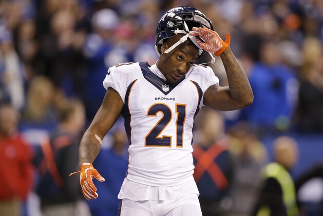 Denver Broncos cornerback Aqib Talib (21) takes off his helmet during the first half of an NFL football game against the Indianapolis Colts, Sunday, Nov. 8, 2015, Indianapolis. (AP Photo/Michael Conroy)